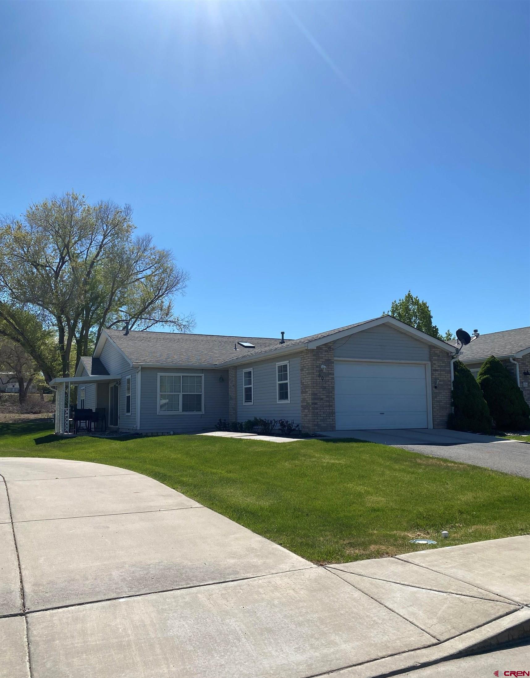 a view of a back yard with a house