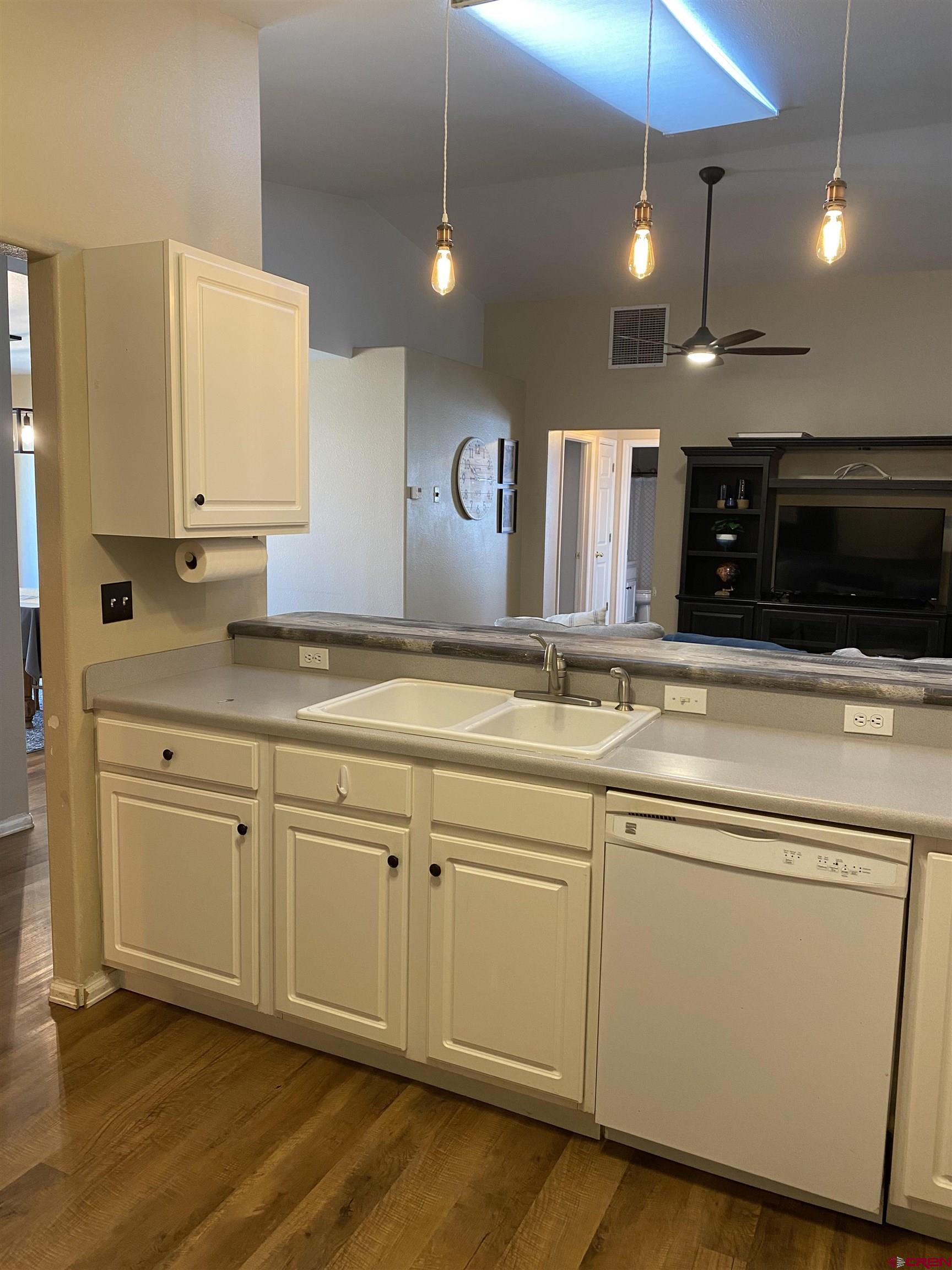 802 Riley Lane Delta, CO 81416 - Photo 8 of 16 a kitchen with stainless steel appliances granite countertop a sink and a stove