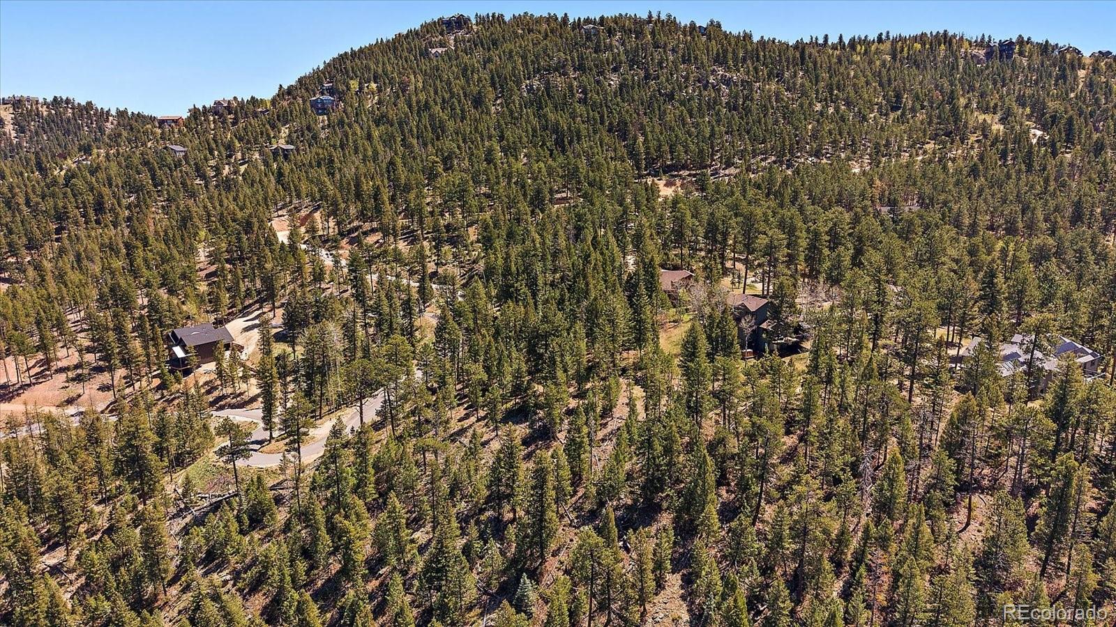 6855 Lynx Lair Road Evergreen, CO 80439 - Photo 19 of 21 a view of a large building