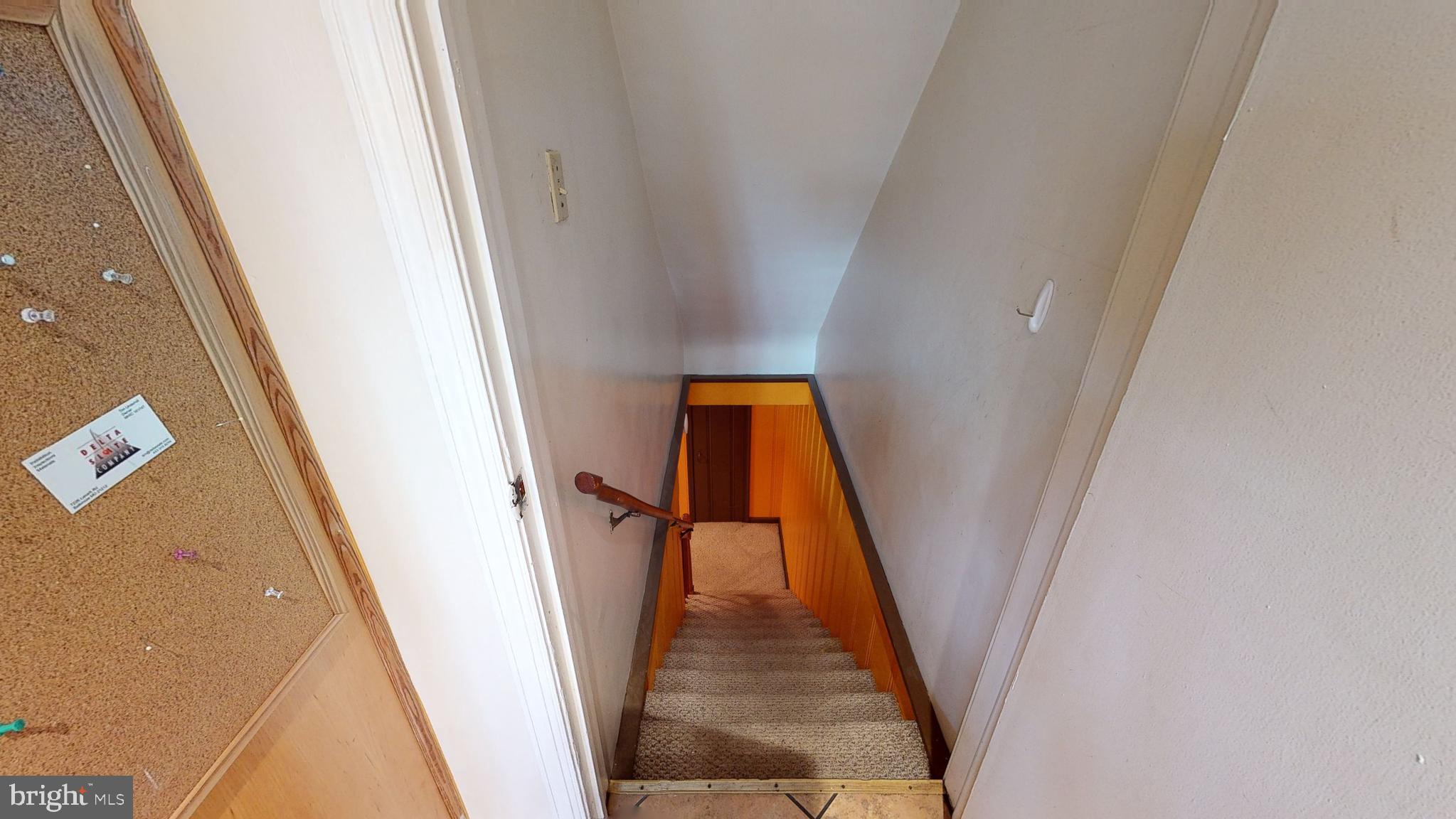 433 Old Trail Baltimore, MD 21212 - Photo 11 of 19 Stairs off kitchen to basement