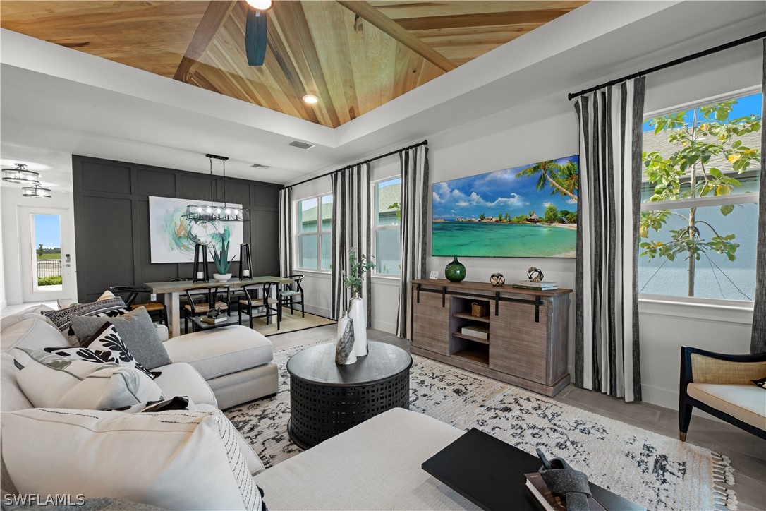 16982 Cottontail Circle Punta Gorda, FL 33982 - Photo 5 of 25 a living room with furniture and a flat screen tv