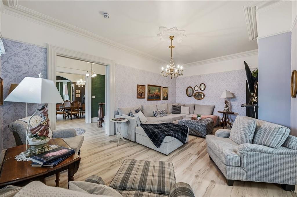131 South Pitt Street Mercer, PA 16137 - Photo 20 of 50 a living room with furniture and a chandelier