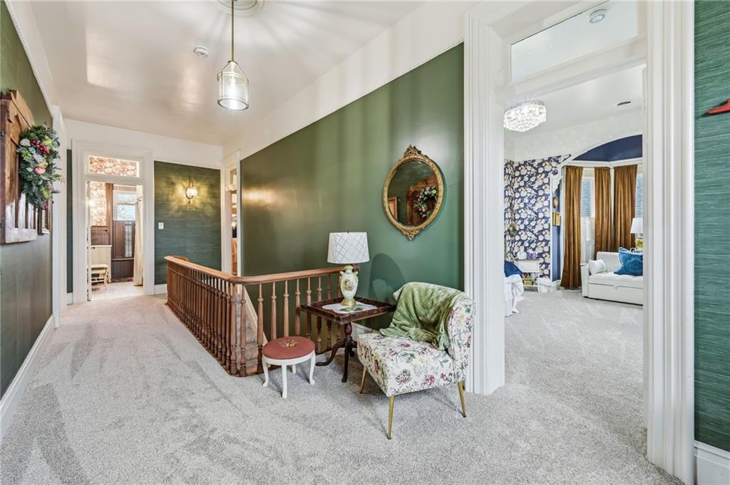 131 South Pitt Street Mercer, PA 16137 - Photo 22 of 50 a view of a hallway with entryway windows chandelier and a chandelier