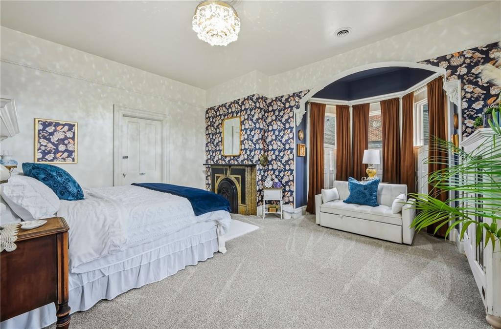 131 South Pitt Street Mercer, PA 16137 - Photo 28 of 50 a spacious bedroom with a bed and a couch