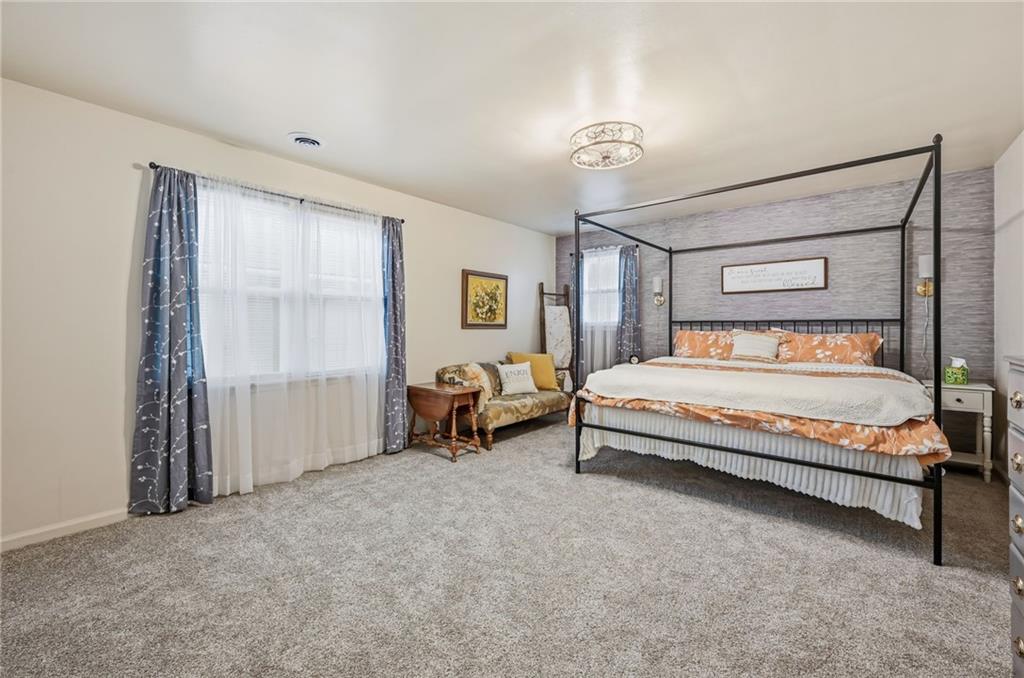 131 South Pitt Street Mercer, PA 16137 - Photo 32 of 50 a spacious bedroom with a bed and a window