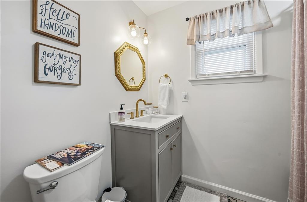 131 South Pitt Street Mercer, PA 16137 - Photo 33 of 50 a bathroom with a sink mirror vanity and toilet