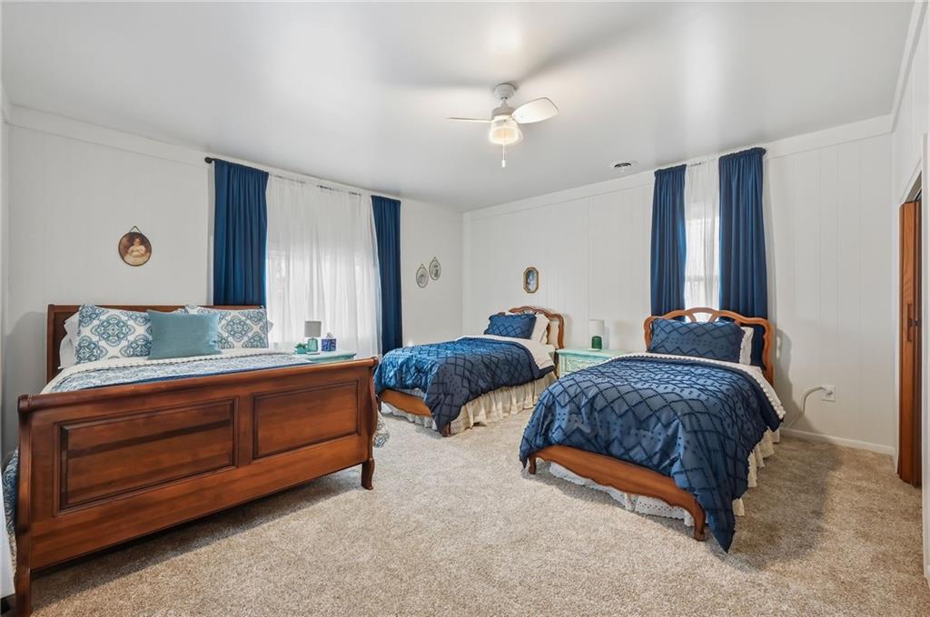 131 South Pitt Street Mercer, PA 16137 - Photo 35 of 50 a bedroom with two beds and painting on the wall