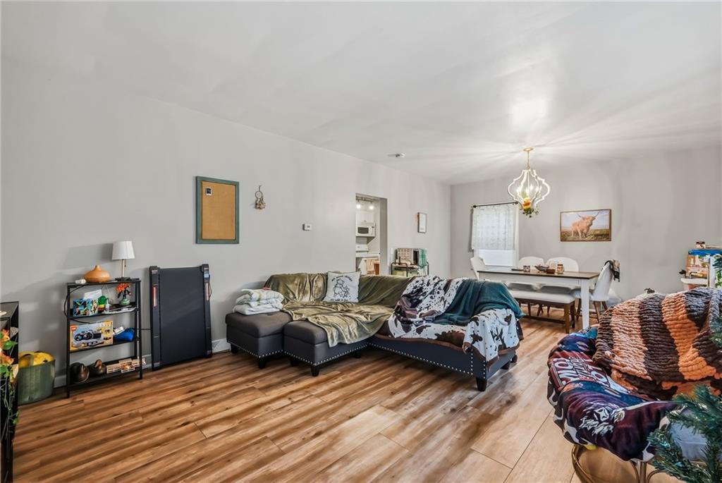 131 South Pitt Street Mercer, PA 16137 - Photo 37 of 50 a living room with furniture and a fireplace
