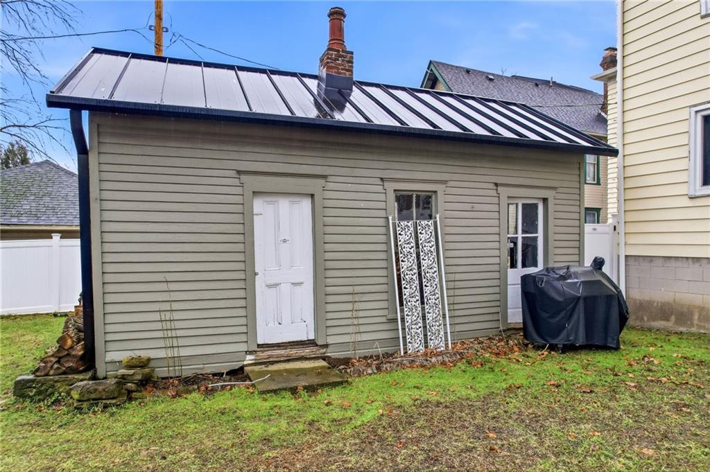 131 South Pitt Street Mercer, PA 16137 - Photo 43 of 50 a front view of a house with garden