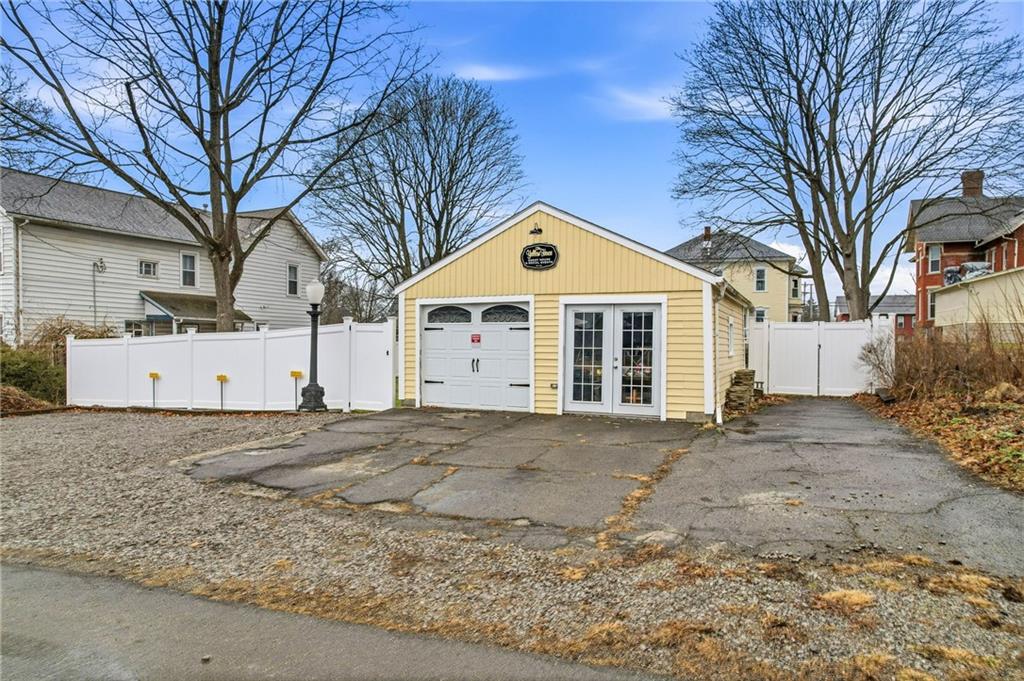 131 South Pitt Street Mercer, PA 16137 - Photo 45 of 50 a front view of a house with a yard and garage