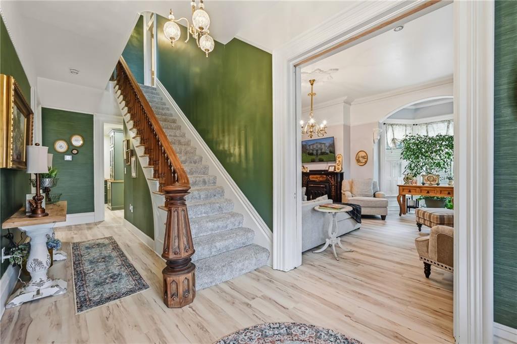 131 South Pitt Street Mercer, PA 16137 - Photo 5 of 50 a living room with furniture and a wooden floor
