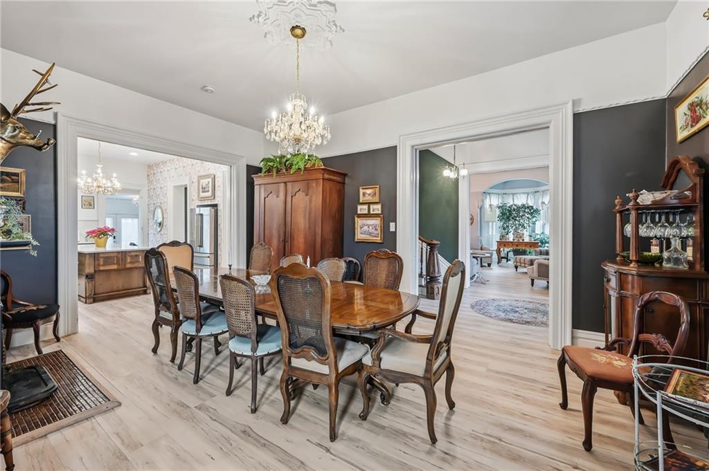 131 South Pitt Street Mercer, PA 16137 - Photo 7 of 50 a view of a dining room with furniture and chandelier