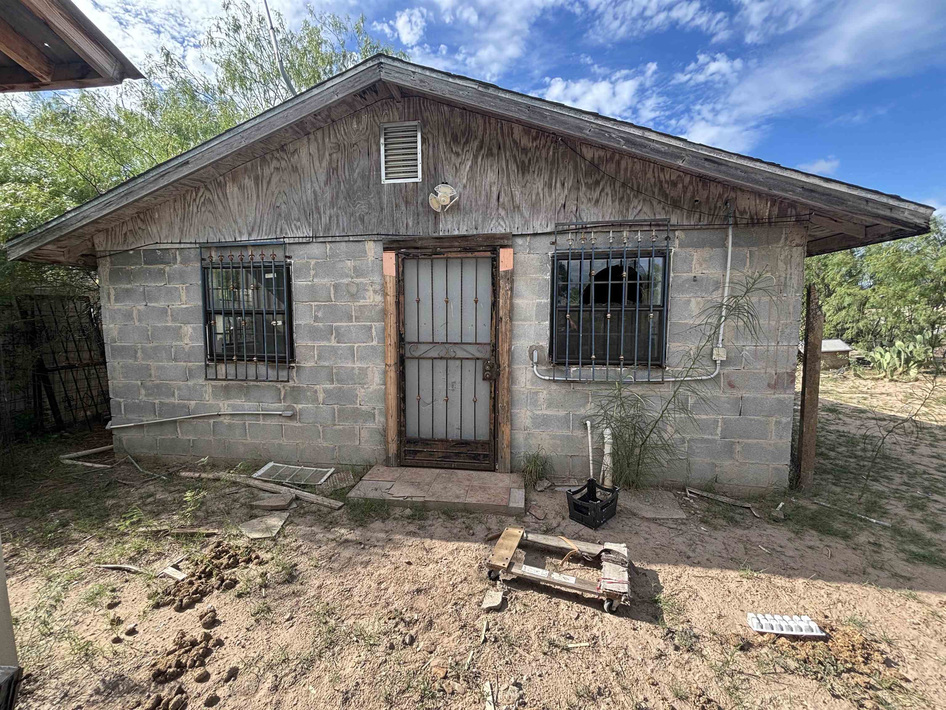 a front view of a house with garage