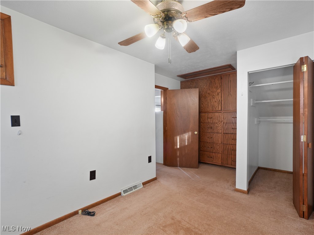 1592 Biltmore Road Cleveland, OH 44124 - Photo 23 of 31 back home 1st floor bedroom with built in cabinetry