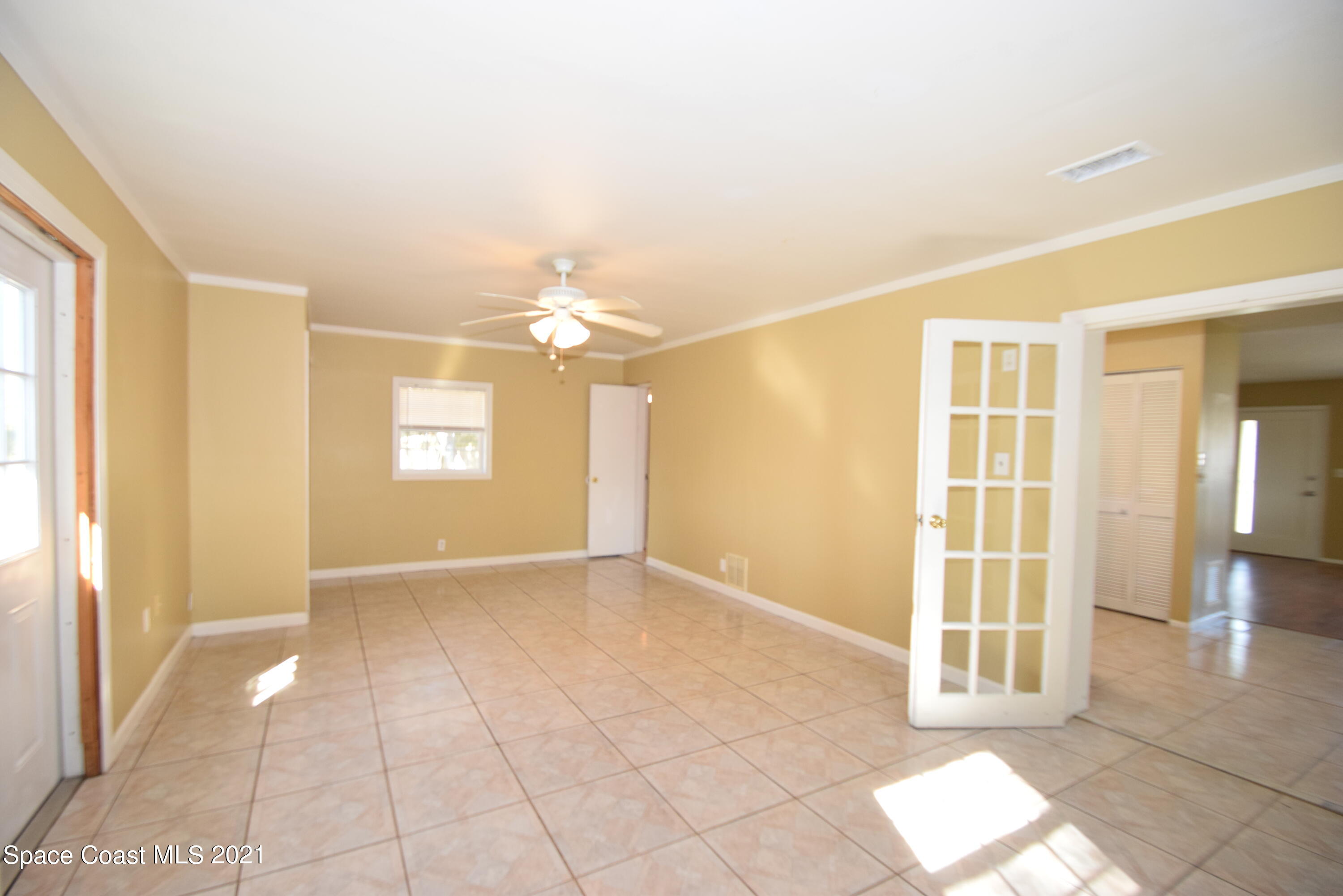680 Aloha Avenue Cocoa, FL 32927 - Photo 14 of 27 a view of an empty room with a window