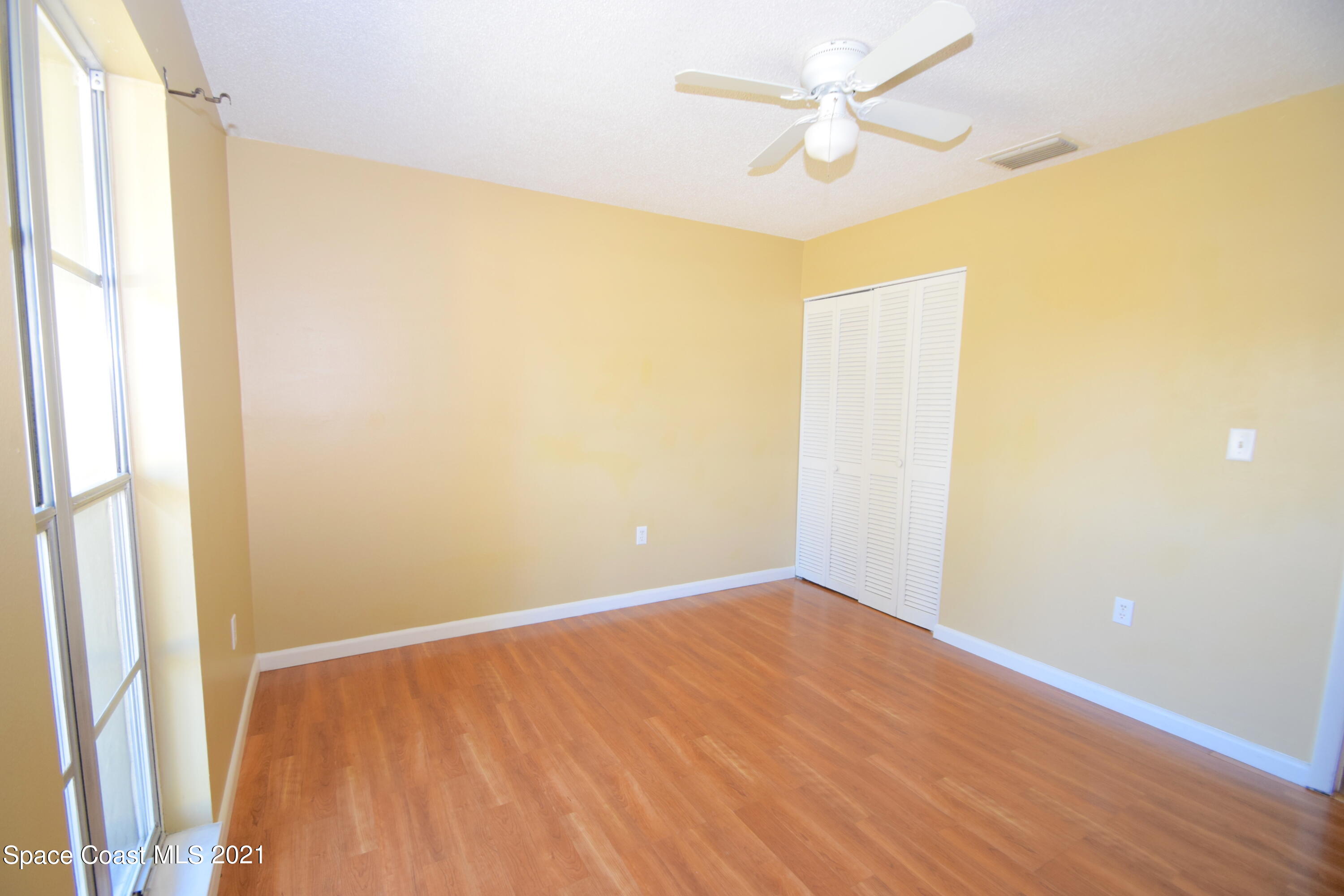 680 Aloha Avenue Cocoa, FL 32927 - Photo 20 of 27 a view of an empty room with a window