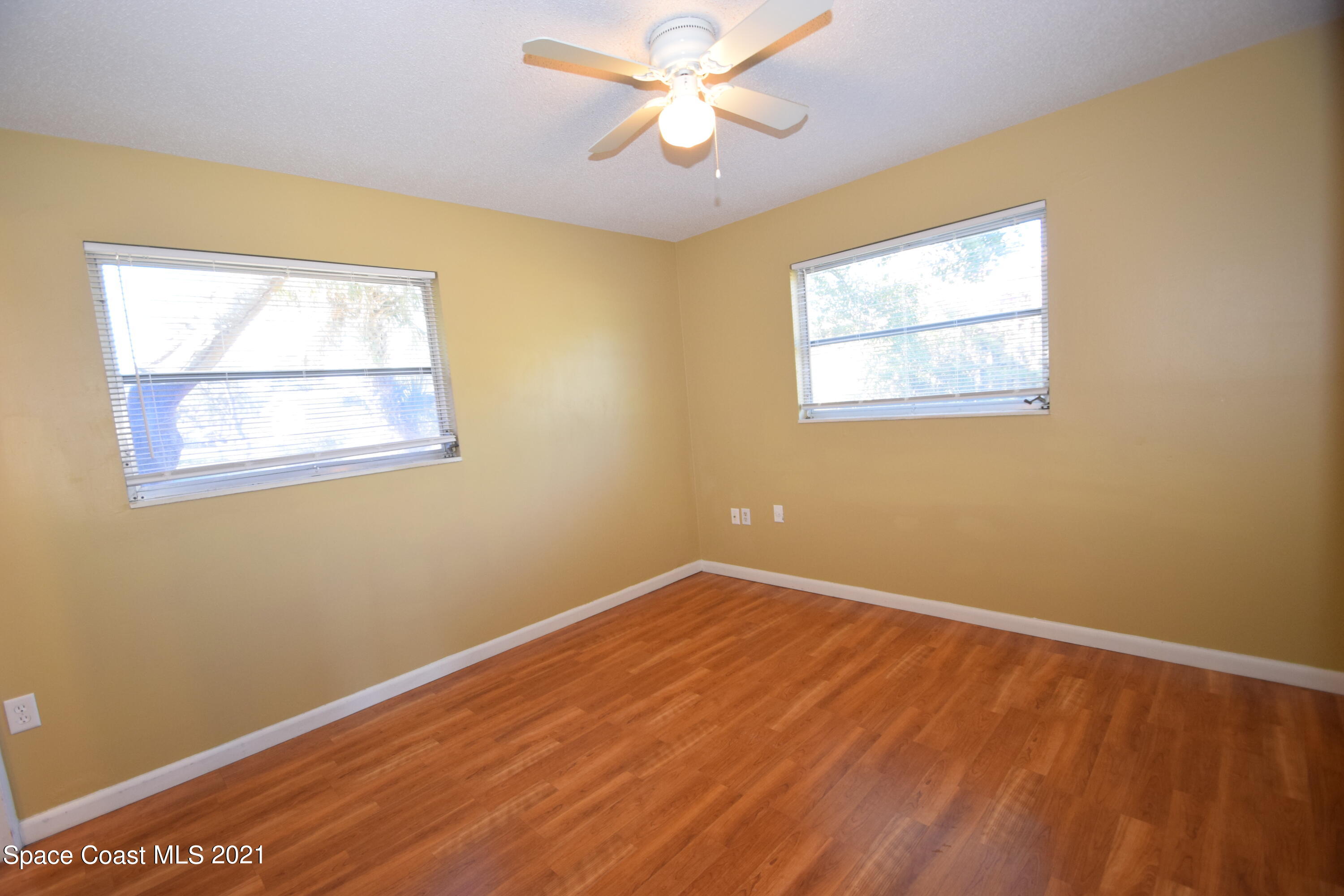 680 Aloha Avenue Cocoa, FL 32927 - Photo 21 of 27 a view of an empty room with a window