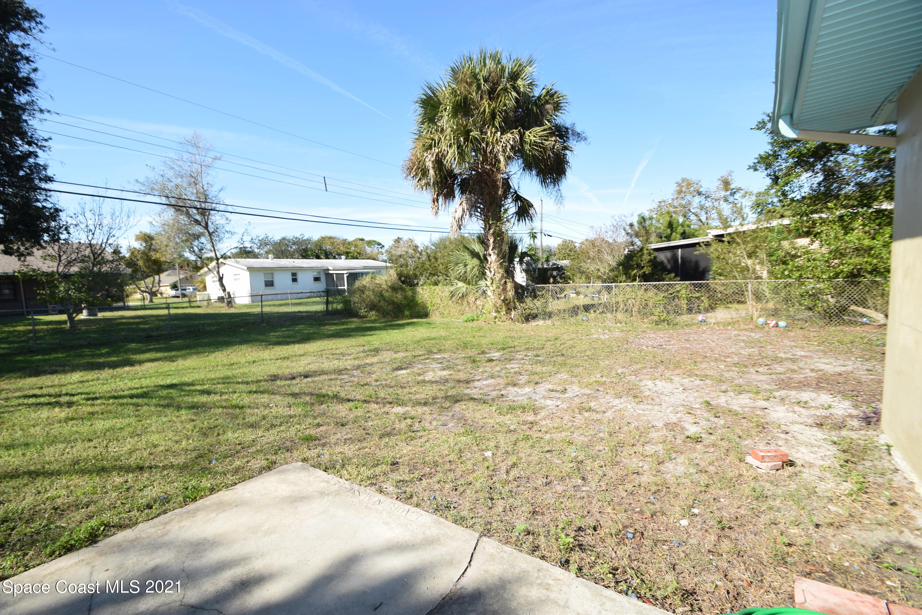680 Aloha Avenue Cocoa, FL 32927 - Photo 4 of 27 a view of a yard with an outdoor space