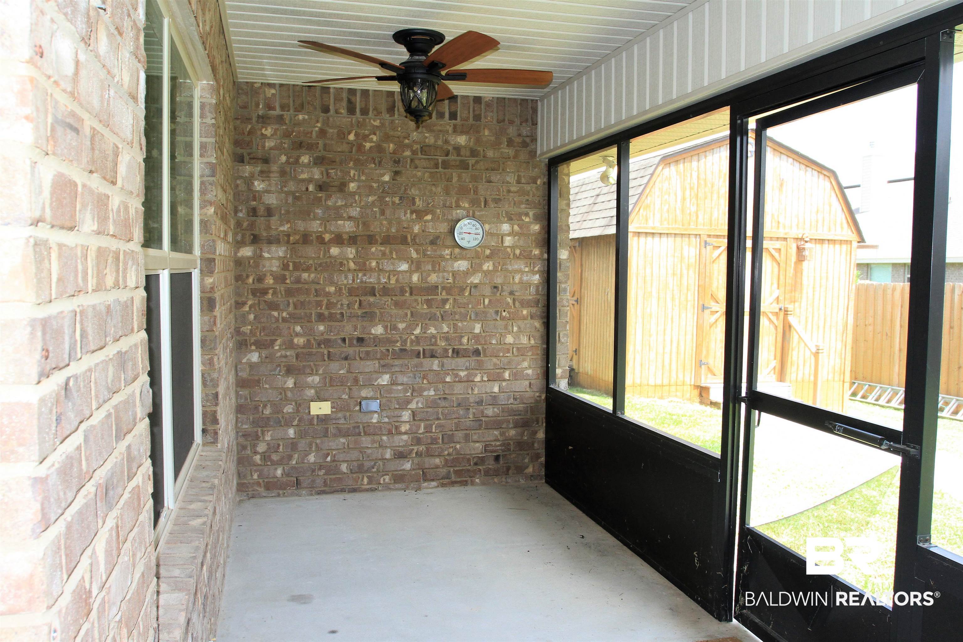 14620 Silvermere Drive Foley, AL 36535 - Photo 18 of 27 Screened patio. View from back door. Double fans.
