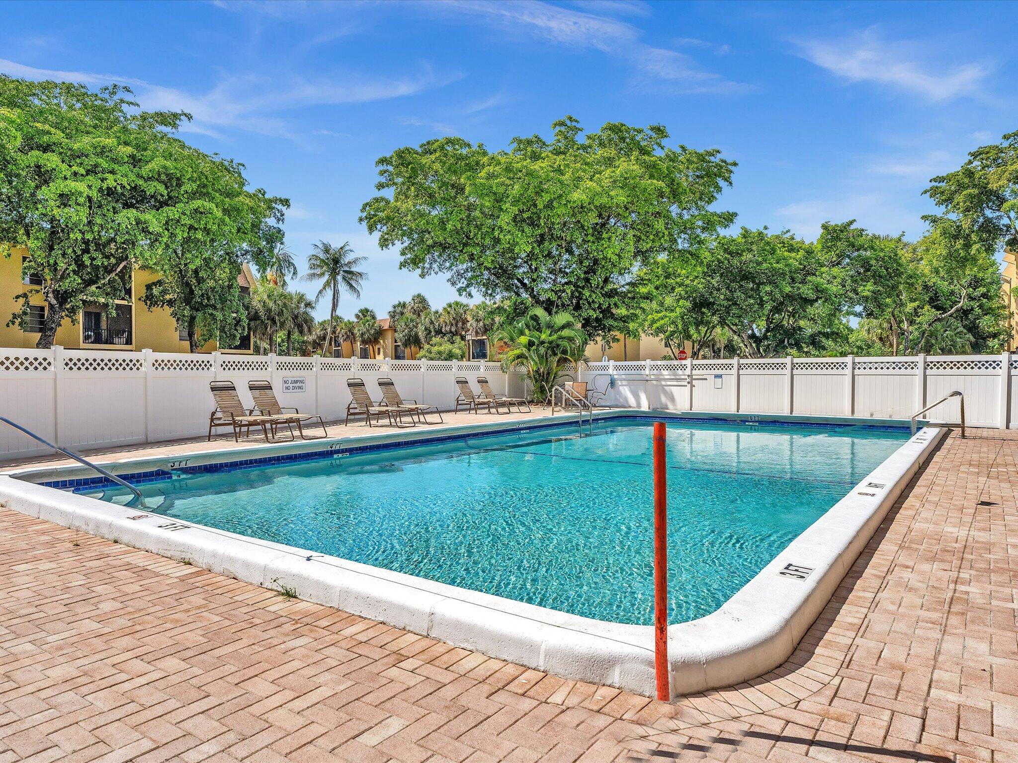 470 Northwest 20th Street, Unit 3020 Boca Raton, FL 33431 - Photo 36 of 43 Fenced Pool Area
