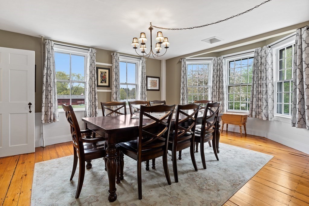 85 Forest Street Dunstable, MA 01827 - Photo 11 of 42 a view of a dining room with furniture window and wooden floor