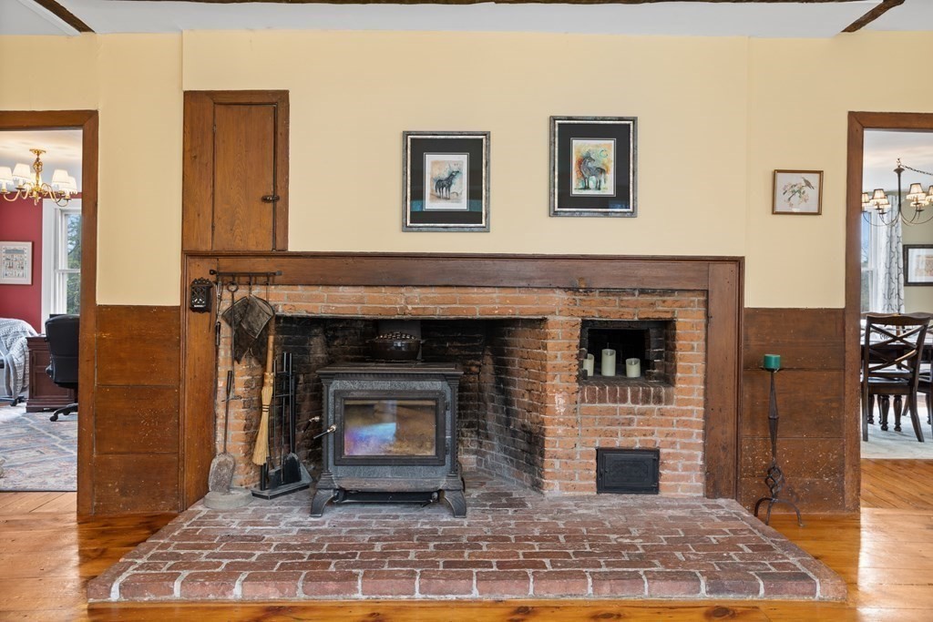 85 Forest Street Dunstable, MA 01827 - Photo 15 of 42 a living room with furniture and a fireplace