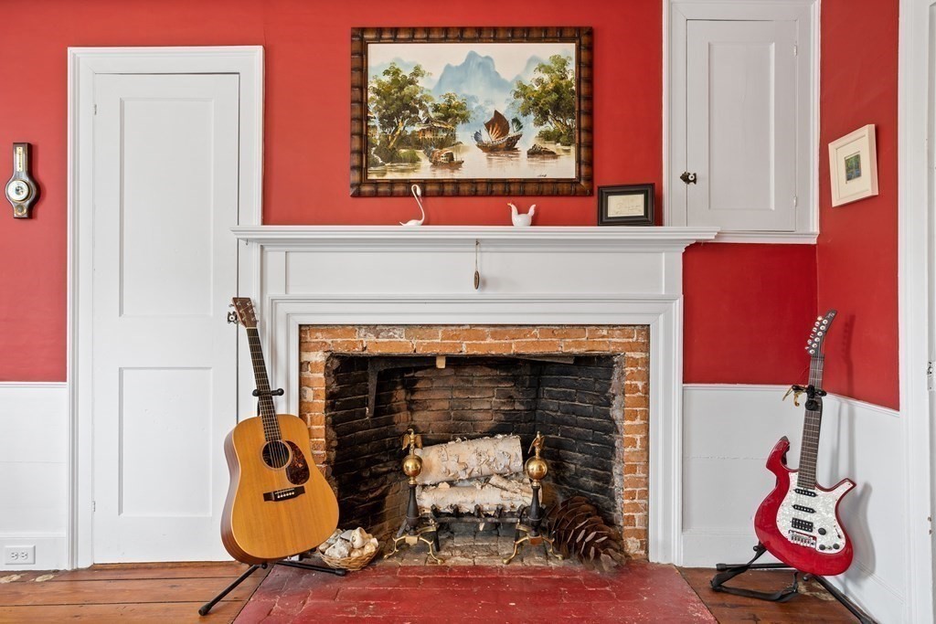 85 Forest Street Dunstable, MA 01827 - Photo 18 of 42 a living room with furniture and a fireplace