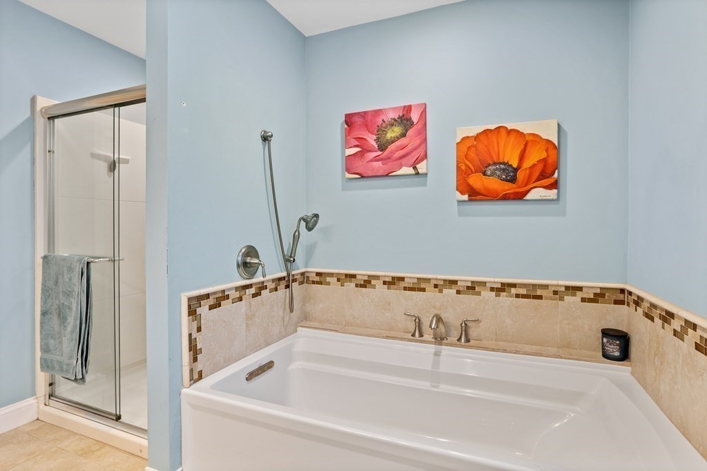 85 Forest Street Dunstable, MA 01827 - Photo 23 of 42 a bathroom with shower and bathtub
