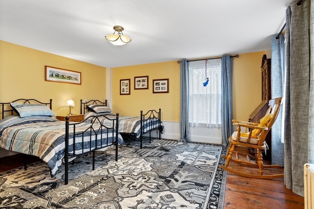 85 Forest Street Dunstable, MA 01827 - Photo 26 of 42 a bedroom with furniture and a window