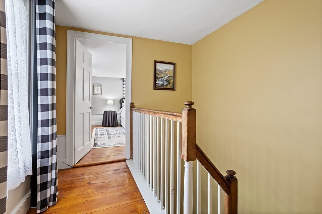 85 Forest Street Dunstable, MA 01827 - Photo 28 of 42 a view of a hallway with a bedroom