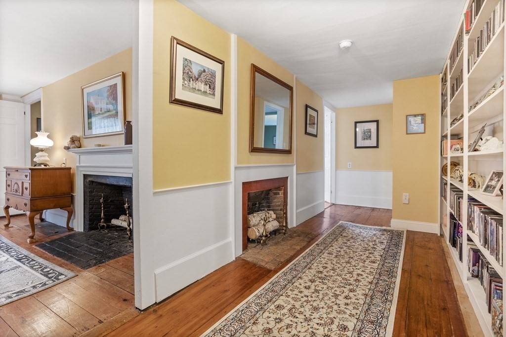85 Forest Street Dunstable, MA 01827 - Photo 29 of 42 a living room with furniture and a fireplace