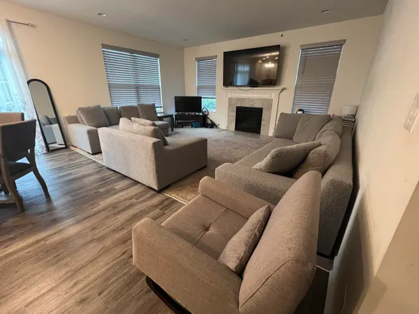 a living room with furniture or fireplace and a flat screen tv