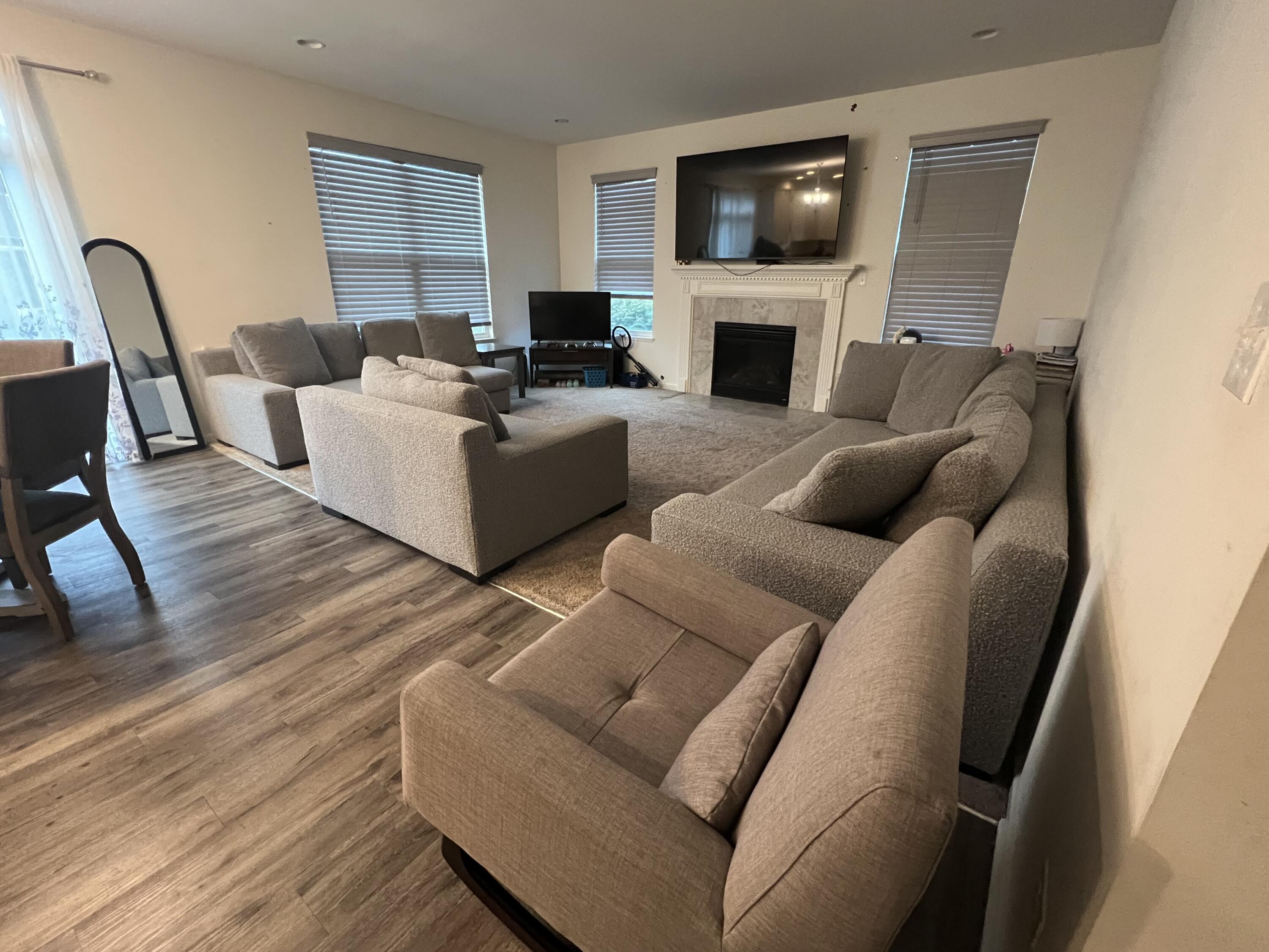 10193 California Street Crown Point, IN 46307 - Photo 17 of 33 a living room with furniture or fireplace and a flat screen tv