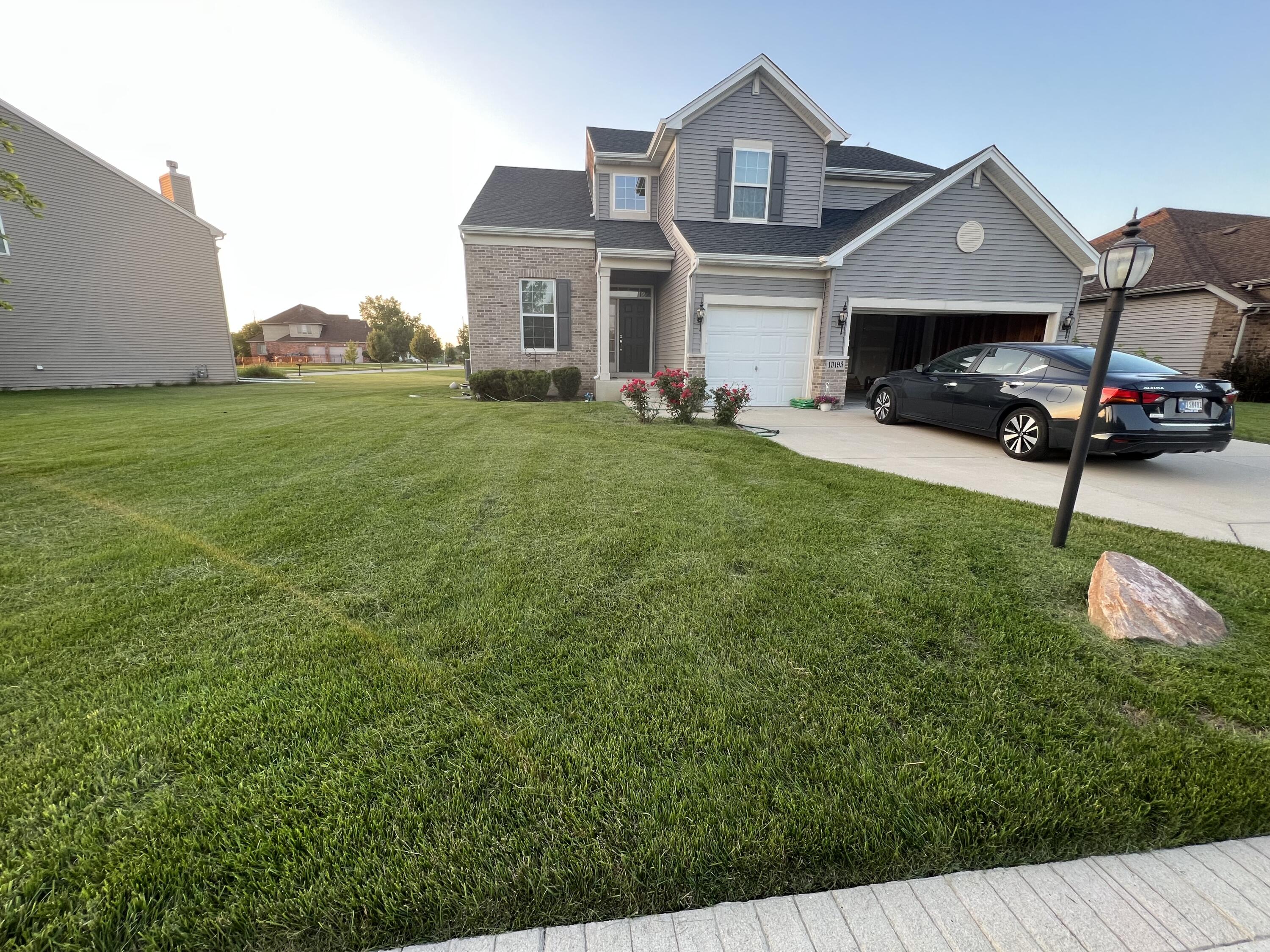 10193 California Street Crown Point, IN 46307 - Photo 23 of 33 a front view of house with an outdoor space and seating