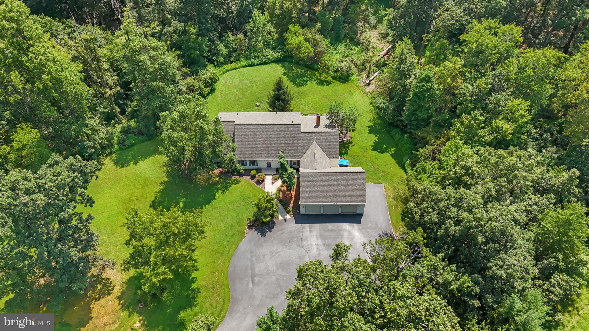 109 Forrest Road Telford, PA 18969 - Photo 8 of 45 an aerial view of a house with a yard
