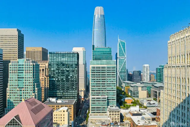 a view of a city with tall buildings