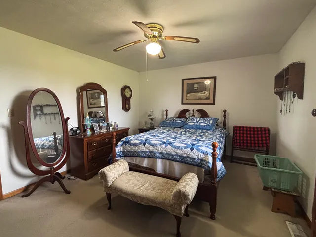 a bathroom with a sink a mirror and a window