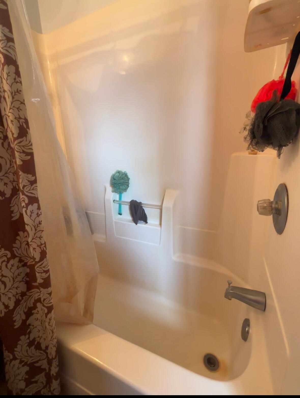 8193 Oak Tree Drive Rensselaer, IN 47978 - Photo 13 of 29 a bath tub sitting next to a white sink