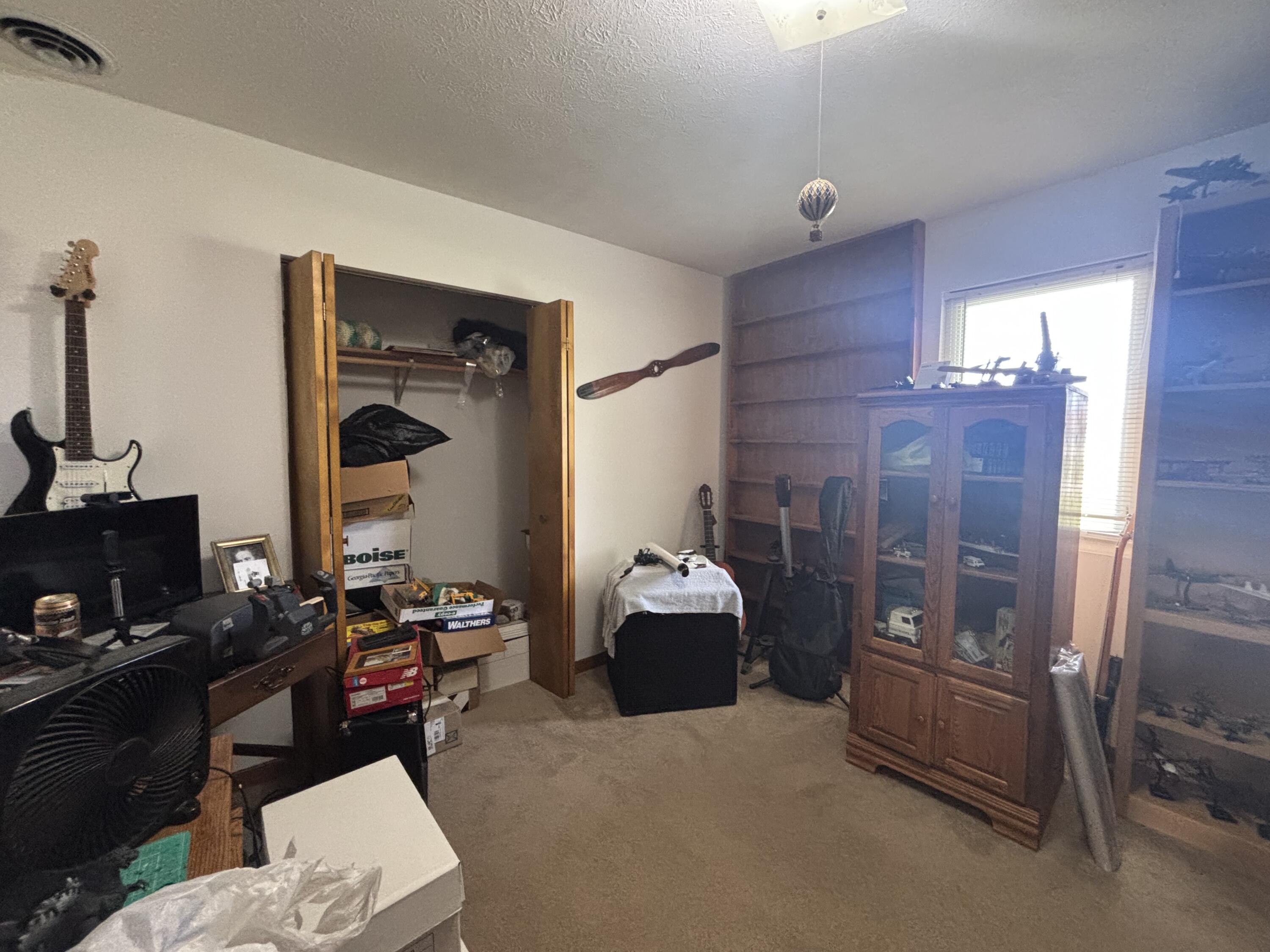8193 Oak Tree Drive Rensselaer, IN 47978 - Photo 17 of 29 a living room with furniture and a window