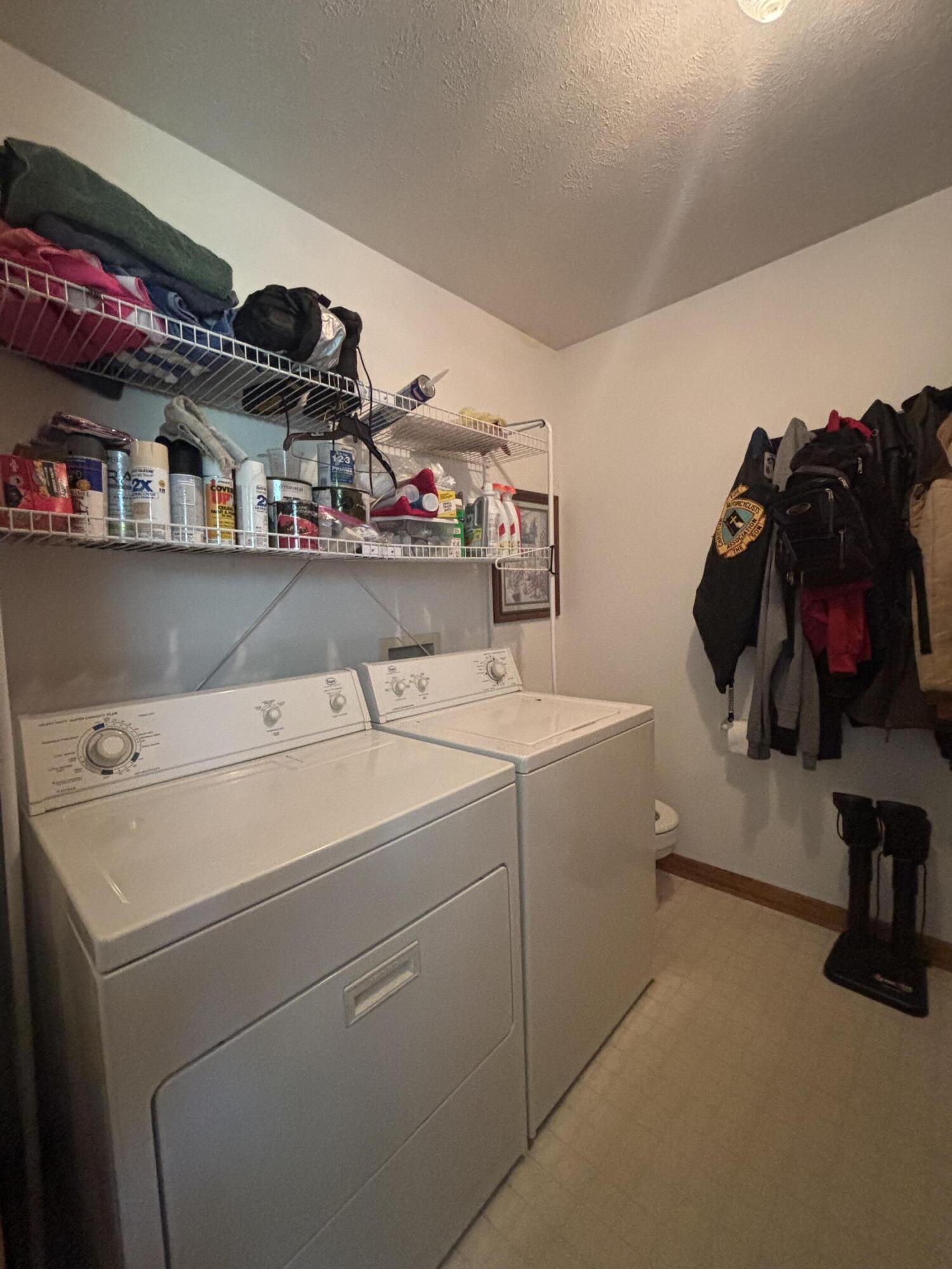 8193 Oak Tree Drive Rensselaer, IN 47978 - Photo 19 of 29 a utility room with dryer and washer
