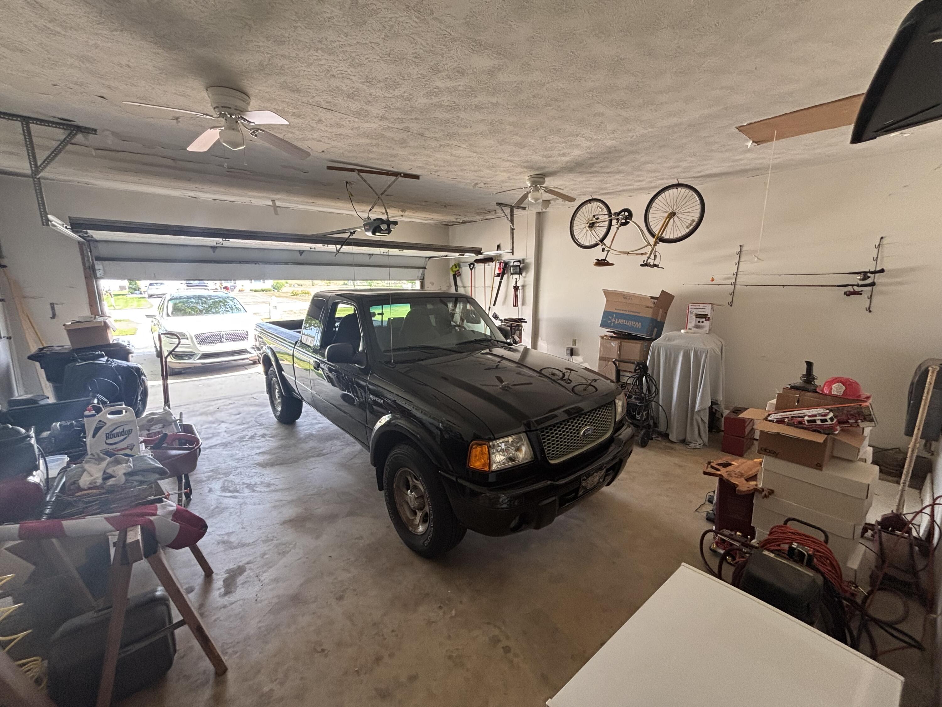 8193 Oak Tree Drive Rensselaer, IN 47978 - Photo 24 of 29 a car parked in garage