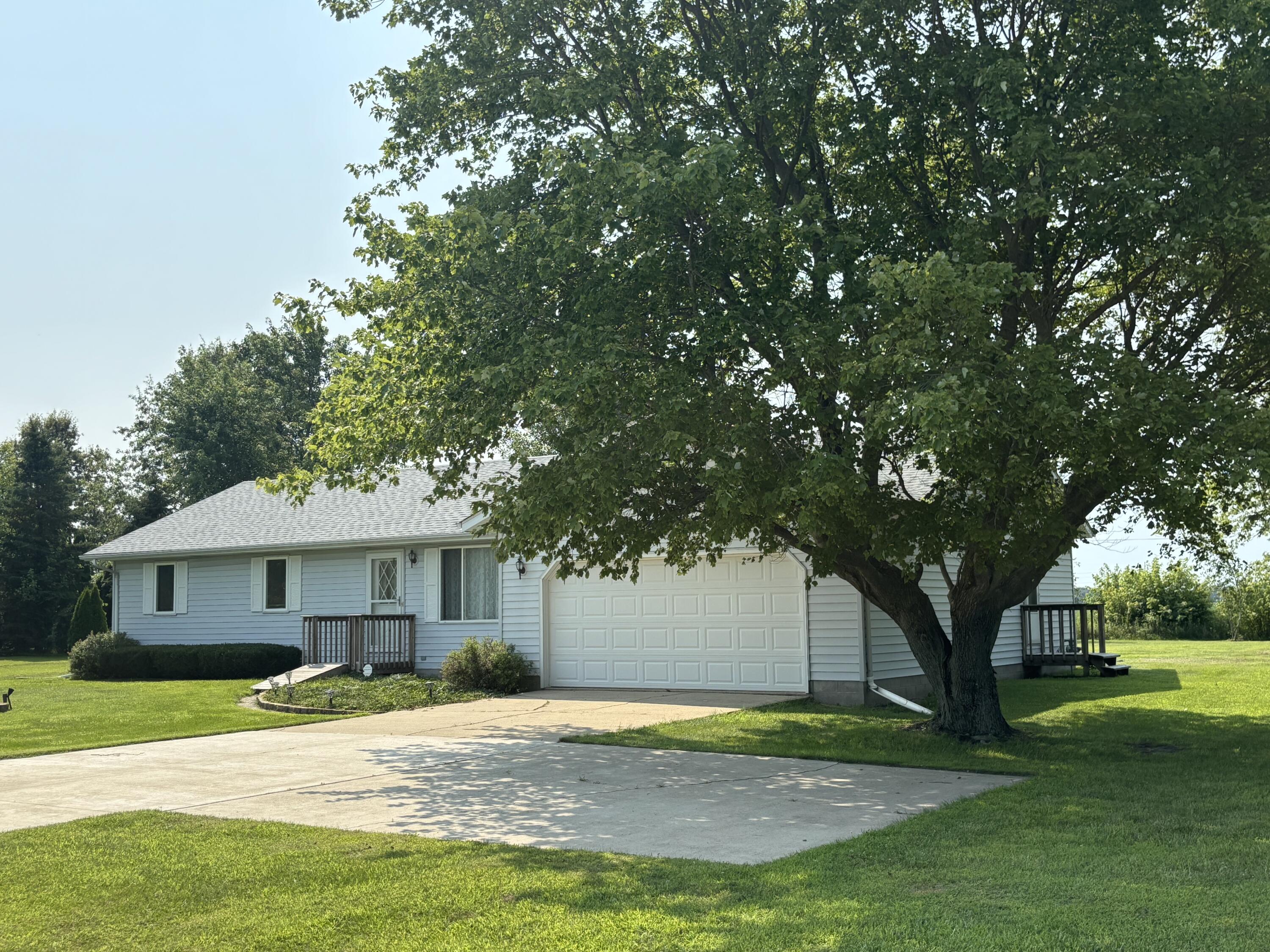 8193 Oak Tree Drive Rensselaer, IN 47978 - Photo 27 of 29 a front view of a house with a yard