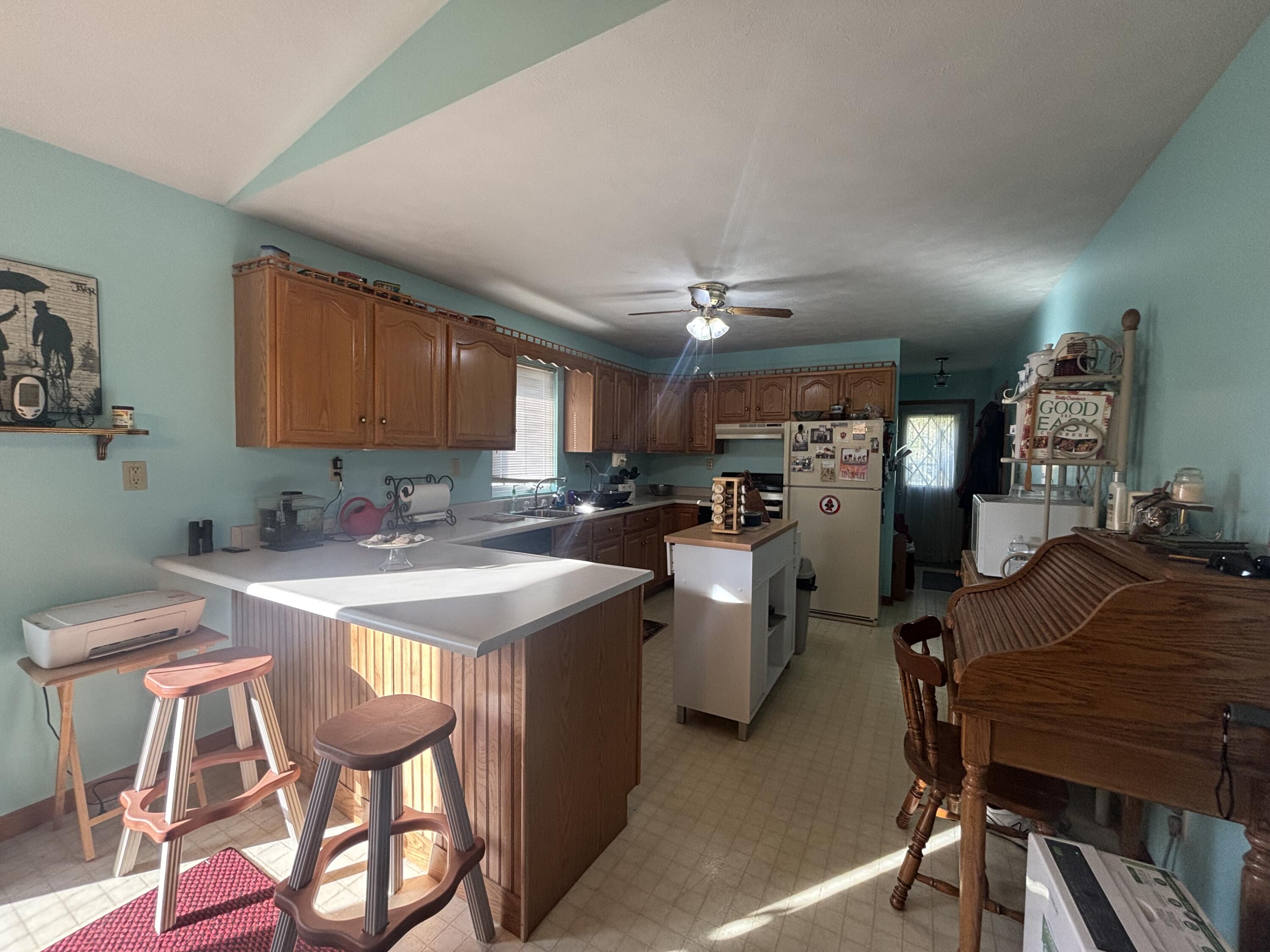 8193 Oak Tree Drive Rensselaer, IN 47978 - Photo 7 of 29 a view of a dining room kitchen and a sink
