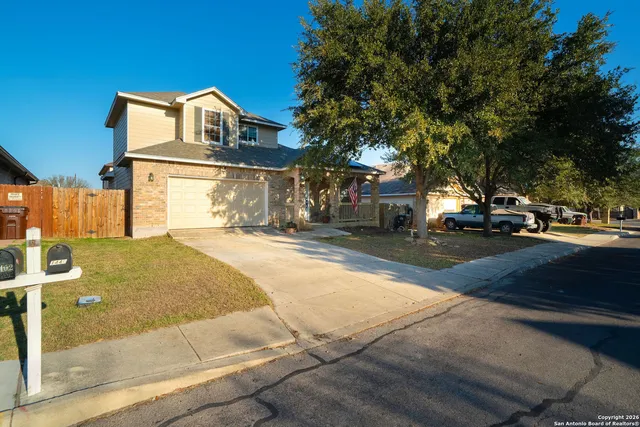 a view of a street with houses