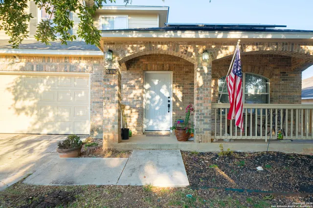 a front view of a building with glass windows and door