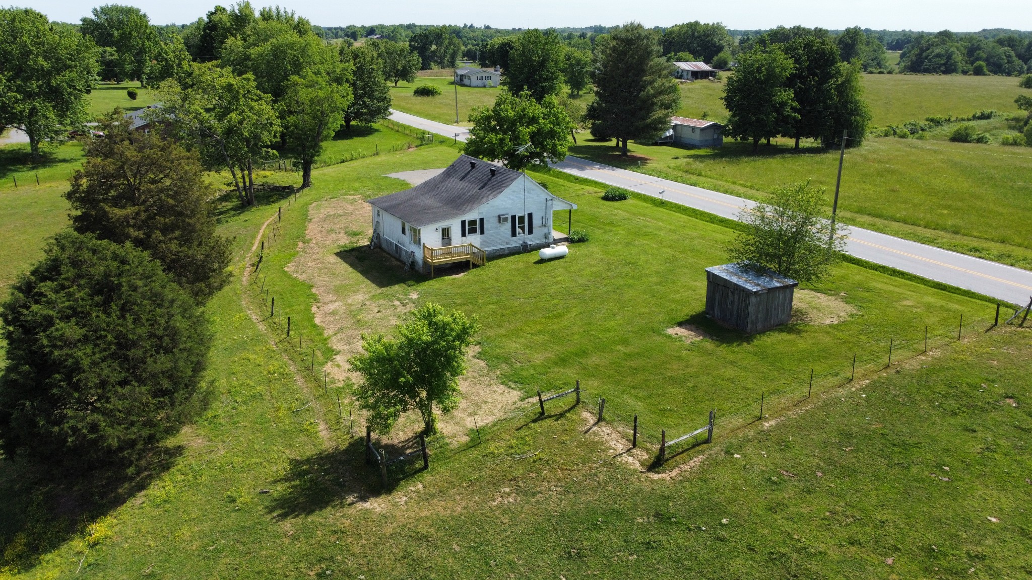 5580 Galen Road Lafayette, TN 37083 - Photo 1 of 16 a view of a garden with a house