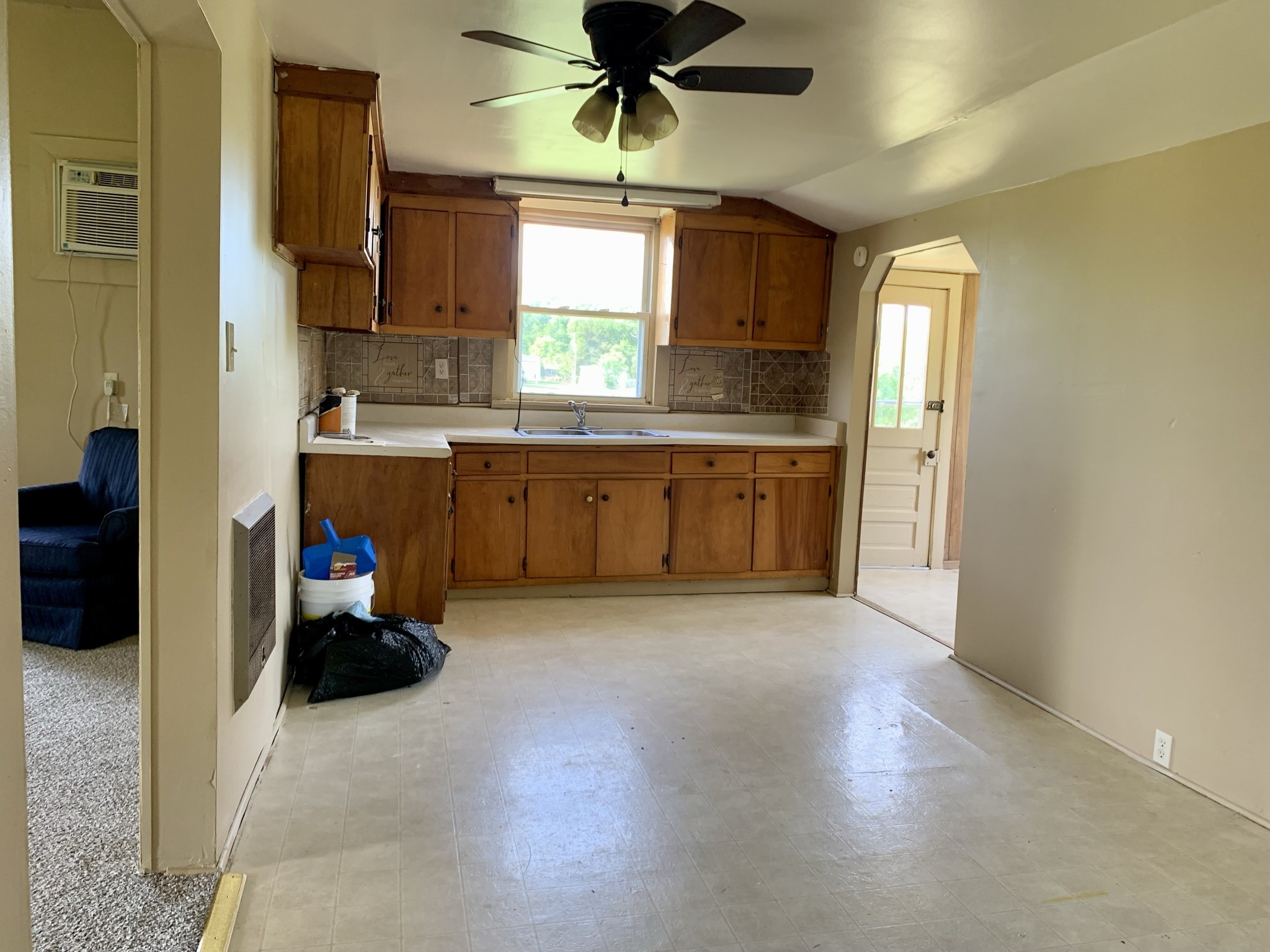 5580 Galen Road Lafayette, TN 37083 - Photo 3 of 16 a kitchen with stainless steel appliances a sink a stove a refrigerator and cabinets