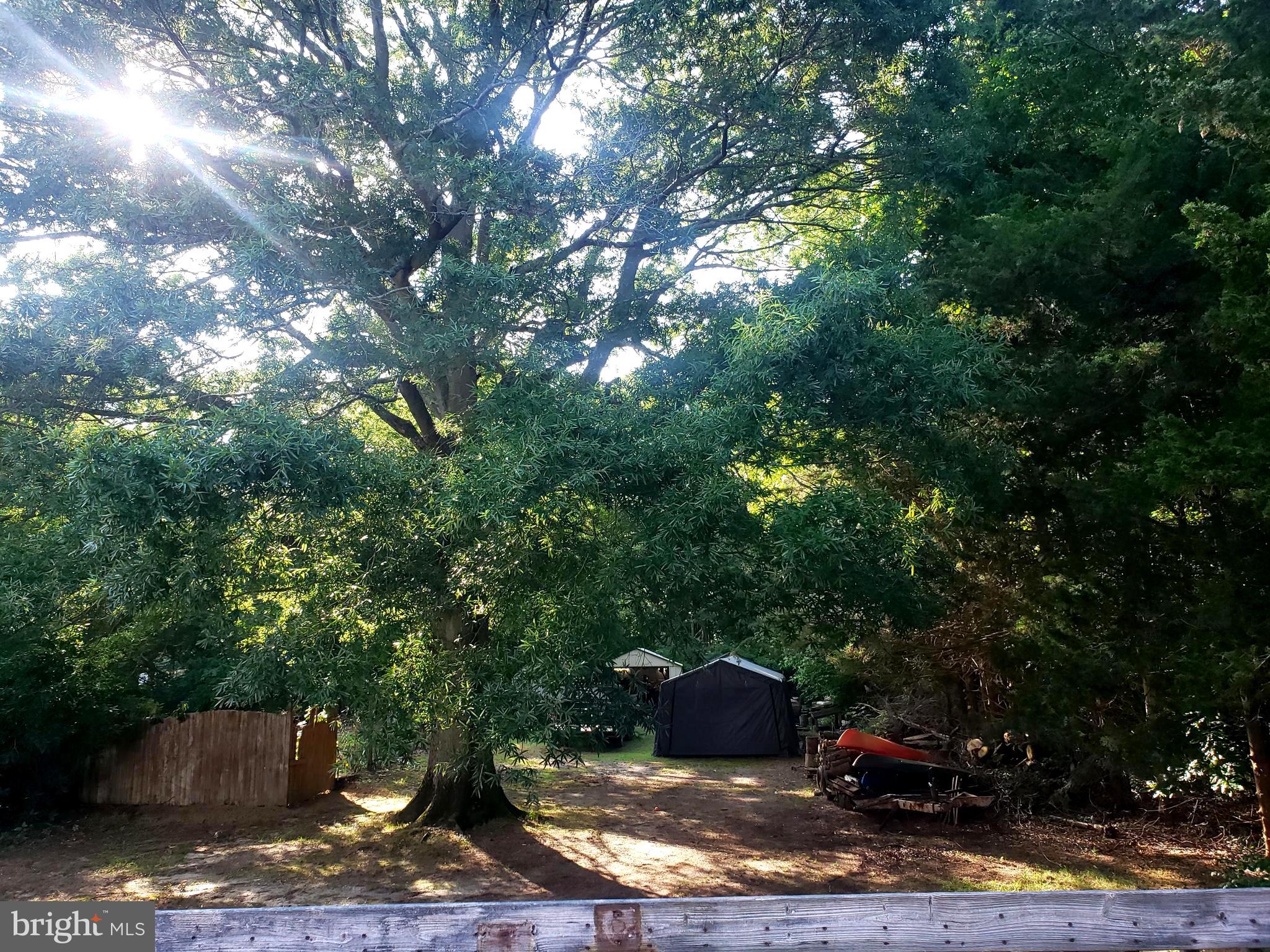 27 Mackeys Lane Leesburg, NJ 08327 - Photo 2 of 29 a view of a backyard of the house