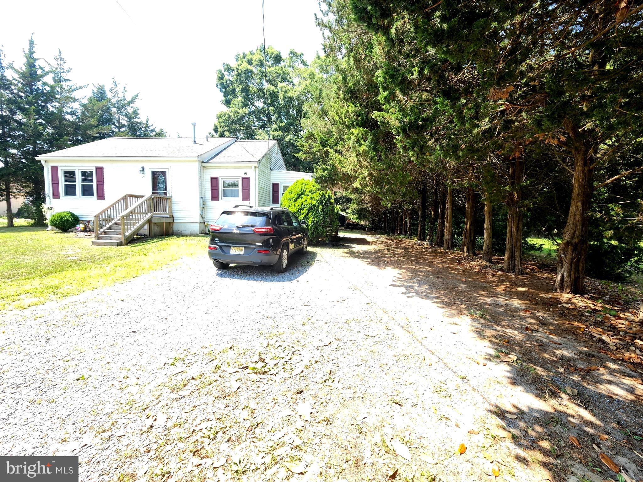 27 Mackeys Lane Leesburg, NJ 08327 - Photo 7 of 29 a view of a house with a patio