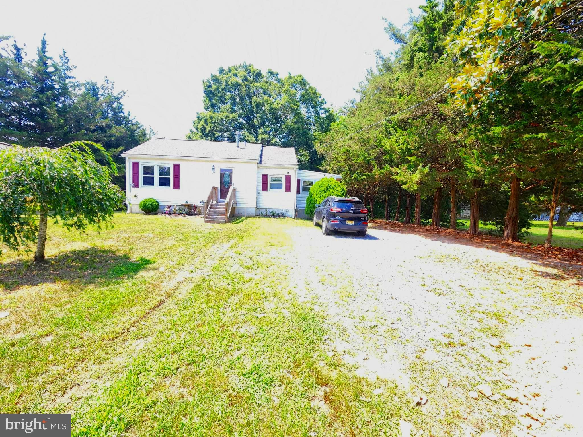 27 Mackeys Lane Leesburg, NJ 08327 - Photo 8 of 29 a view of a house with a yard